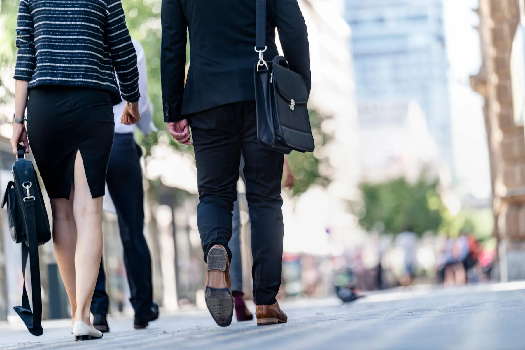 Business people walking in a city street